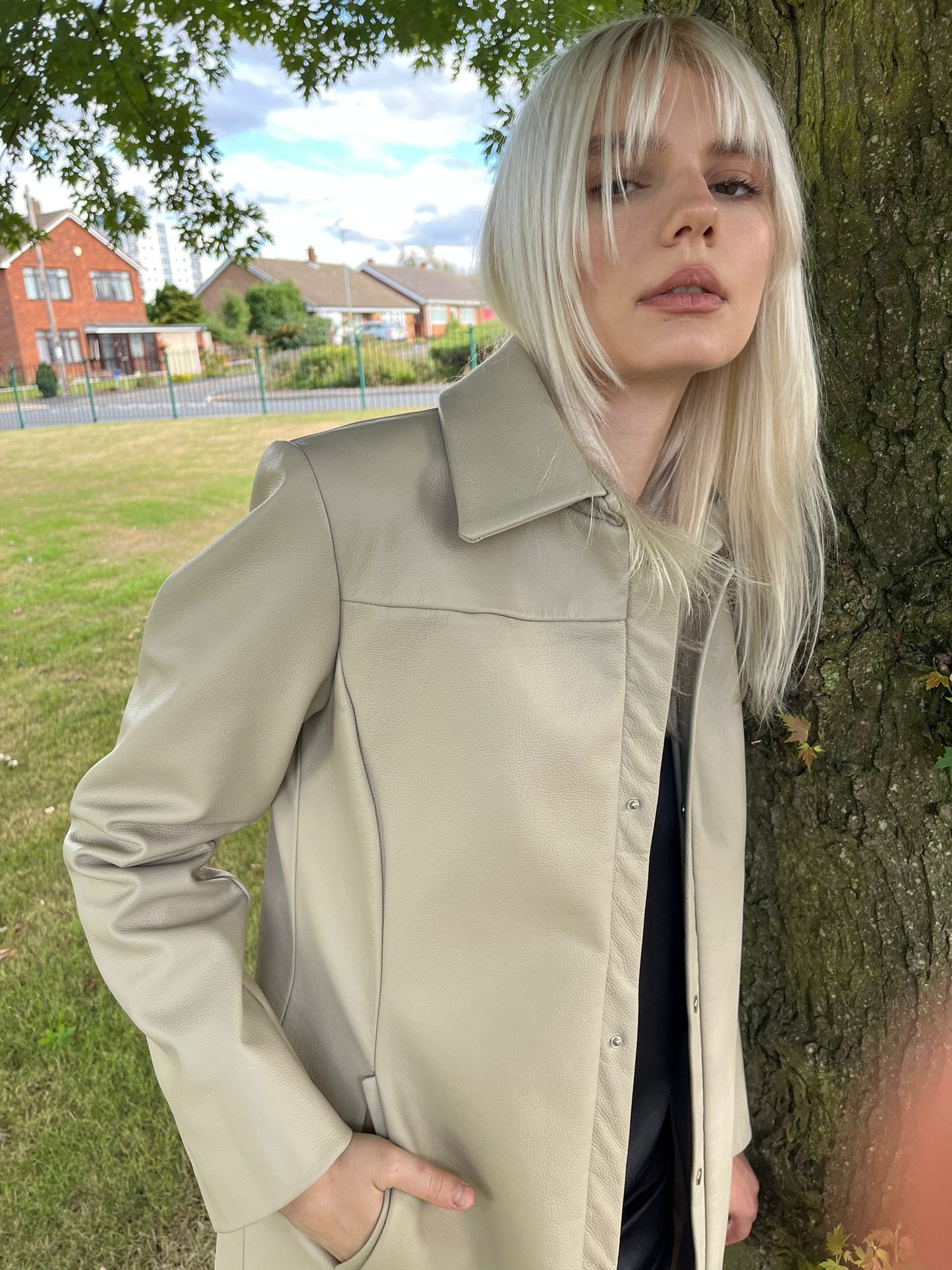 Genuine leather coat made from fabric waste